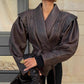 Strap up short long sleeved jacket